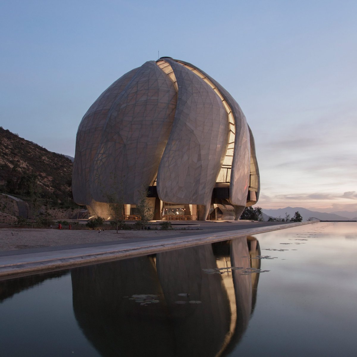 dezeen's tweet image. Sufi whirling dancers and Japanese bamboo baskets among the references for this sculptural temple in Chile: on.dezeen.com/Q4w50M