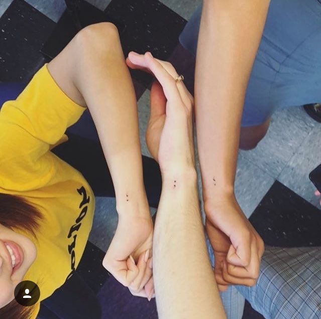 13RWarchive's tweet photo. Alisha and Tommy went with Selena Gomez to get matching semicolon tattoos to support project semicolon https://t.co/RmgEpWQb28