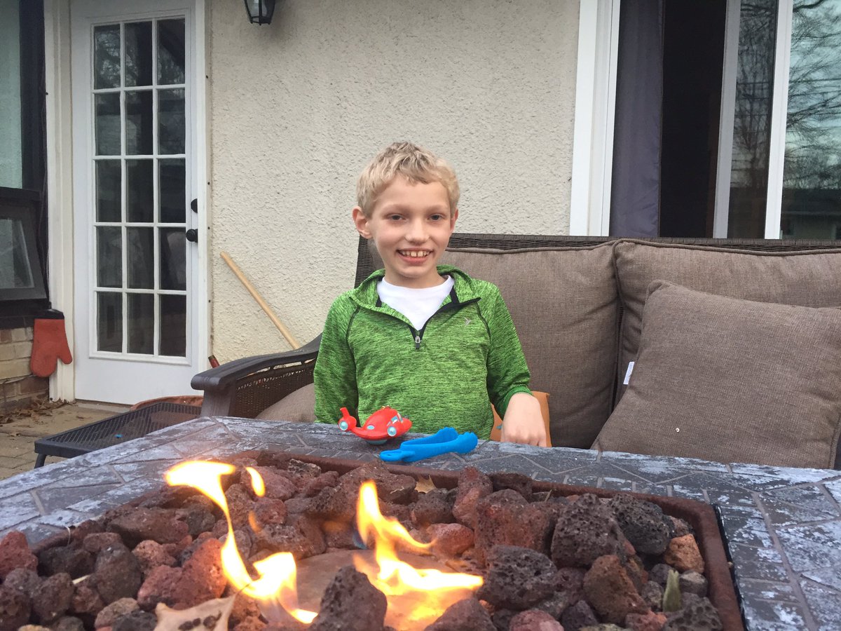 aoliver57's tweet photo. Enjoying my evening with Alex. #eveningfires #familiytime #wearingpurpleforthiskid https://t.co/rS9JSIdPzf
