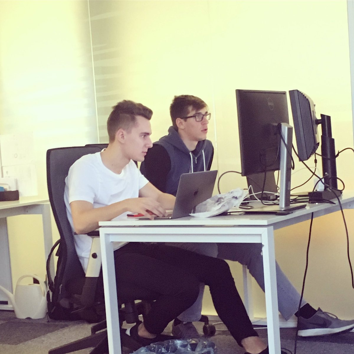 PixmanCZ's tweet photo. Giving a whole new meaning to a #shared #workspace 😂 our #developers don't stop! 
#workisfun #startuplove #teamwork #pixman #hustlegang https://t.co/HoUCQSvapw
