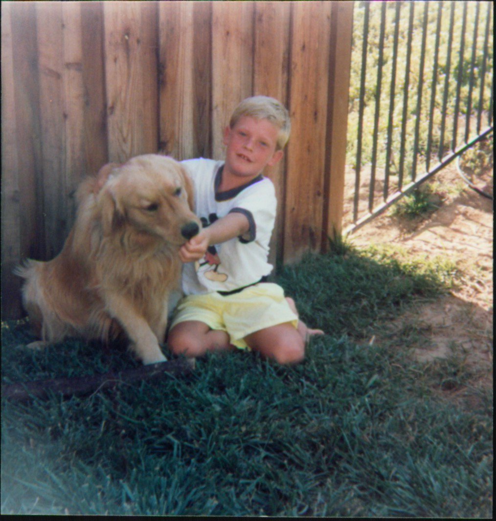 Happy #NationalPet Day! Here'a s pic from my archives of me with Dodger, my favorite golden retriever of all time.
