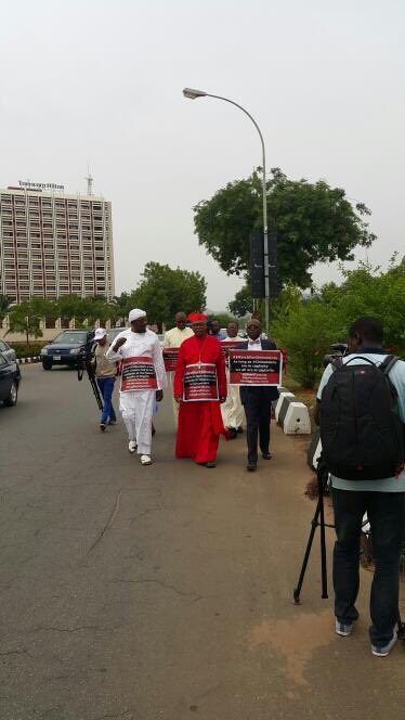 MKabrik's tweet photo. We have set out of the Unity Fountain Cardinal Onaiyekan, Shiekh Nura Khalid,Pastor Nedu, Sis Agatha,other Men of Faith 
#IMarch4ChibokGirls https://t.co/crNOOyXFmx
