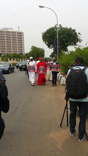 MKabrik's tweet photo. We have set out of the Unity Fountain Cardinal Onaiyekan, Shiekh Nura Khalid,Pastor Nedu, Sis Agatha,other Men of Faith 
#IMarch4ChibokGirls https://t.co/crNOOyXFmx