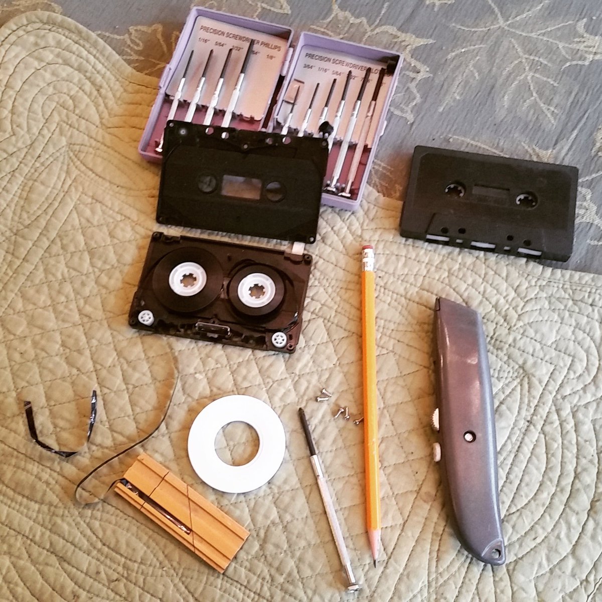 FrigidTouch's tweet photo. The downside of #cassettes. Broke out my #editing block, a fresh #razor blade &amp; got to #work. Finally managed a clean #splice! #music #songs https://t.co/7CV8IR7OlZ