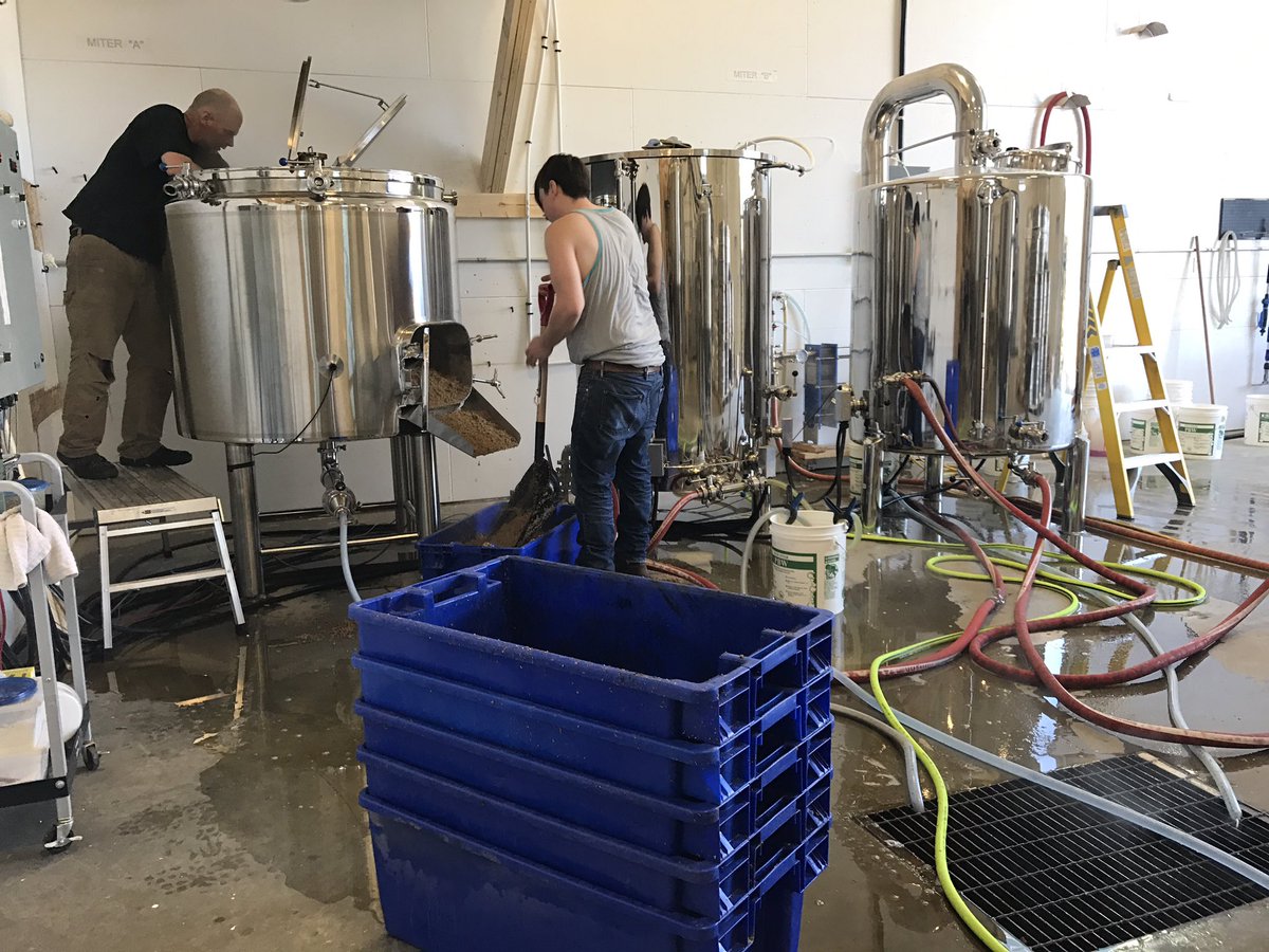 winterlongbeer's tweet photo. First 7 bbl brew on the new system! Matt and Alex tested out the goods with Sullen Riot rye pale ale. #7bbl #yukoncraftbeer #newbrewhouse https://t.co/P42oGzypvH