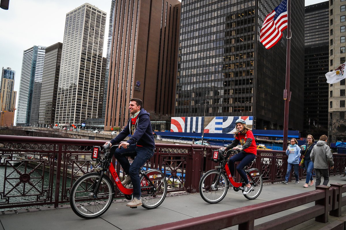 NHLBlackhawks's tweet photo. Today we unleashed the new fleet of playoff @DivvyBikes! Hawks fans took each #BlackhawksBike for its inaugural ride throughout Chicago. https://t.co/iyHqOog7iA