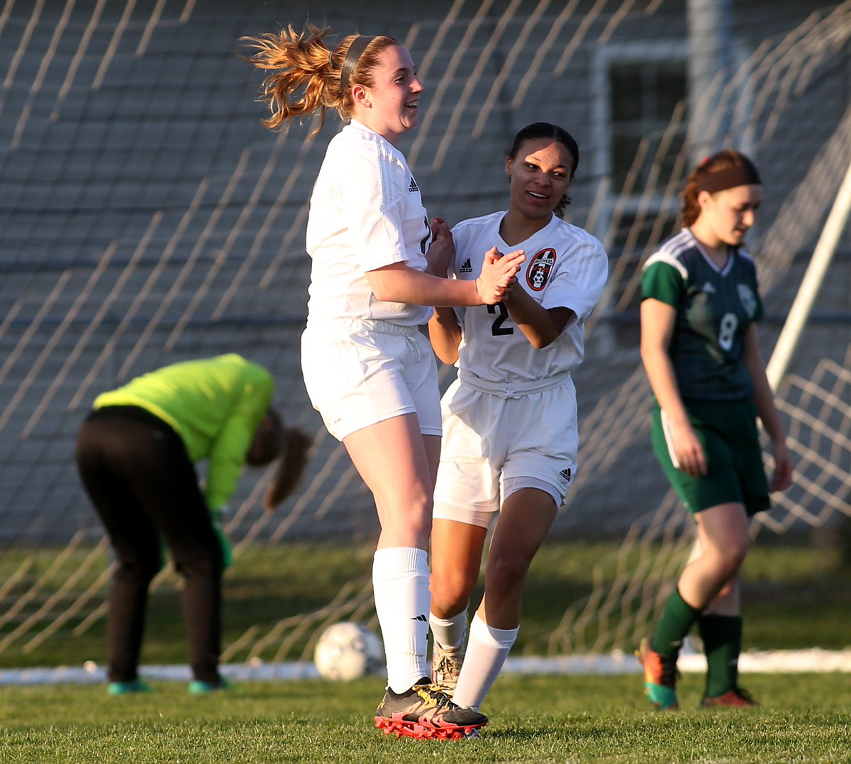 .<a href="/uths_athletics/">AD</a> Bryanna Copas (L) celebrates her goal with teammate Jamine Huset against <a href="/AllemanGSoccer/">Alleman Girls Soccer</a> during first half. UT wins 2-0.