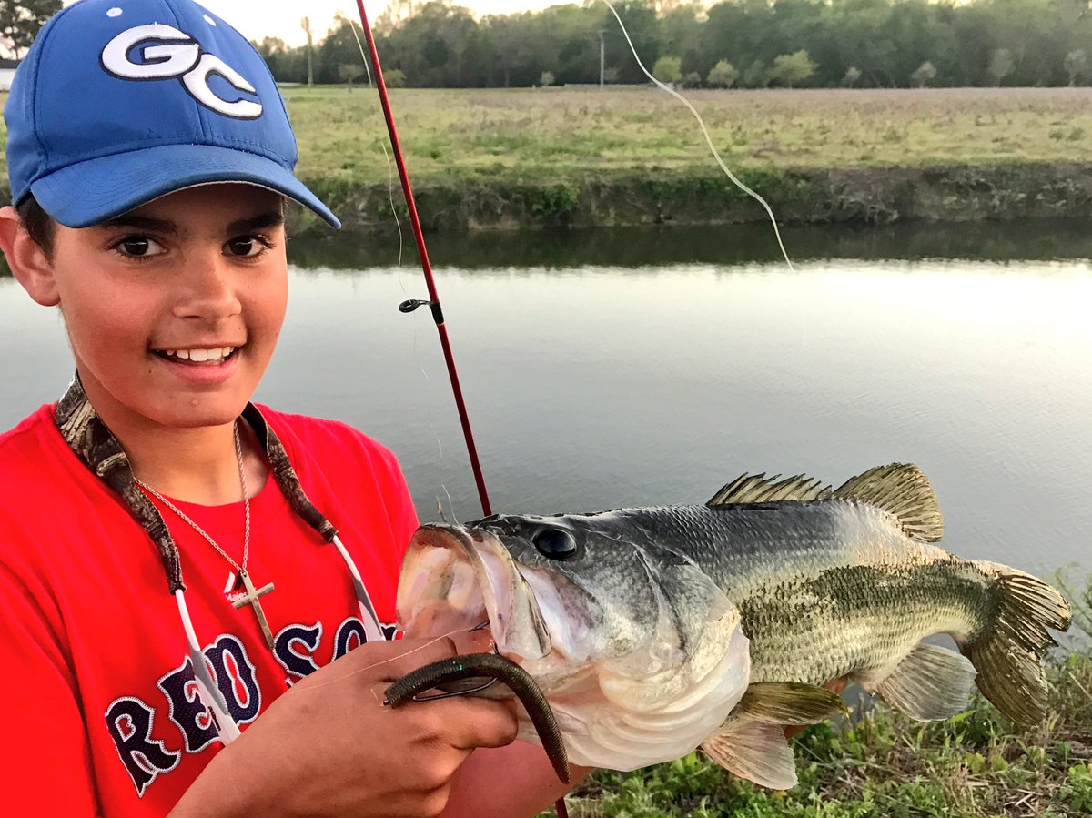My buddy, Nathan, with the two biggest bass he's ever caught! 🎣 Congrats on the personal bests, Nate! #takeakidfishing