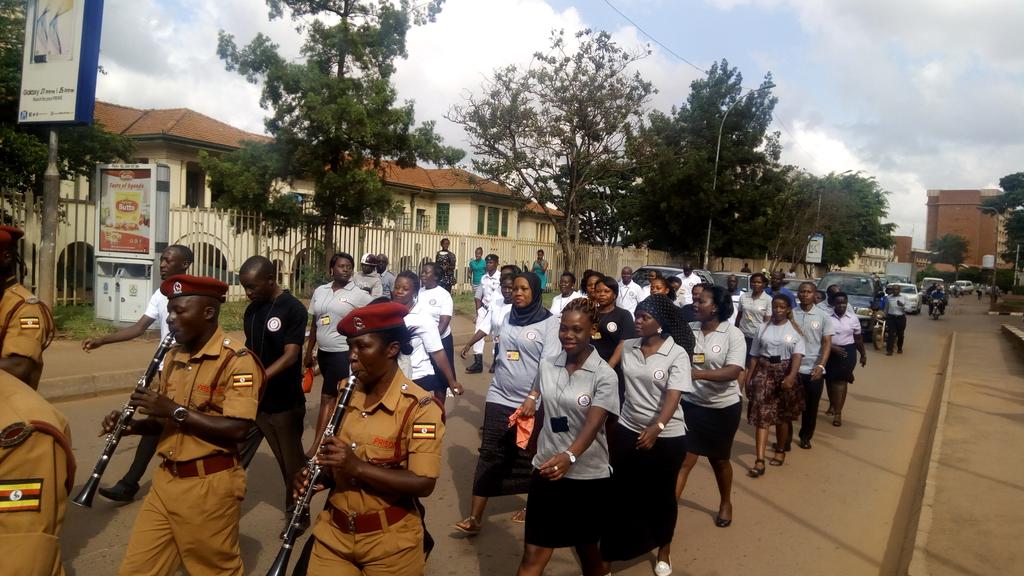 JudiciaryUG's tweet photo. Happening now, staff of Buganda Road Court match in Kampala streets #CourtOpenDay https://t.co/K13mRktLw8