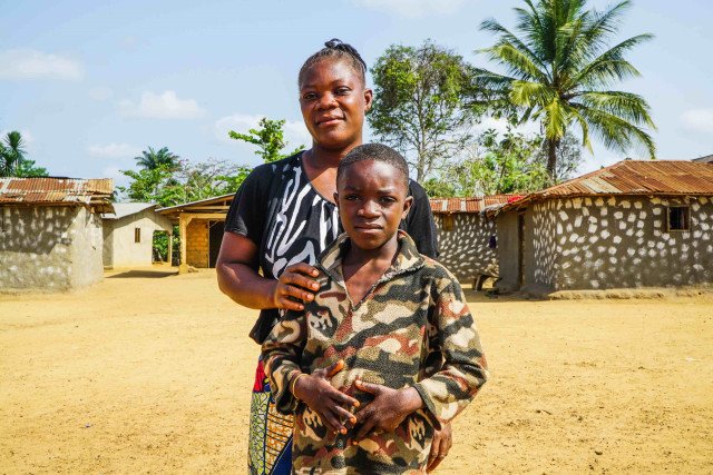 Mami Brown with her son Armstrong, 9, who was left out of a Bridge school in Liberia. Find out more here: tinyurl.com/LiberiaPSL #unite4ed