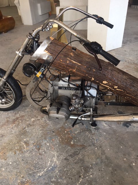 Spotted at Milan Design Week: a Belgian designer who incorporated a tree trunk with a motorcycle #design #wood #timber