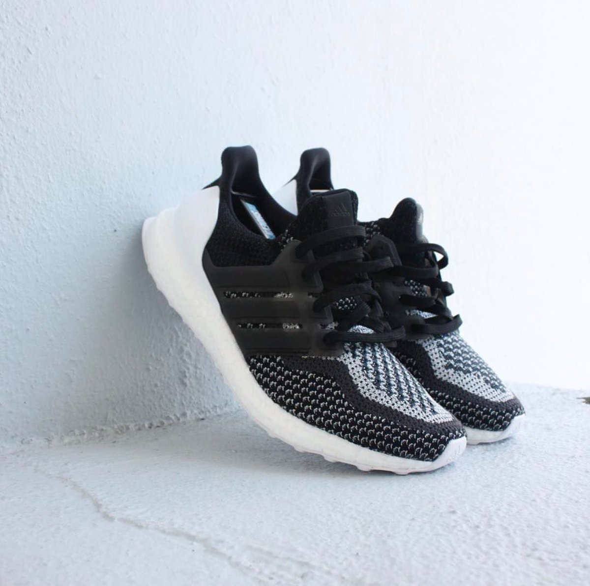ultra boost uncaged black and white