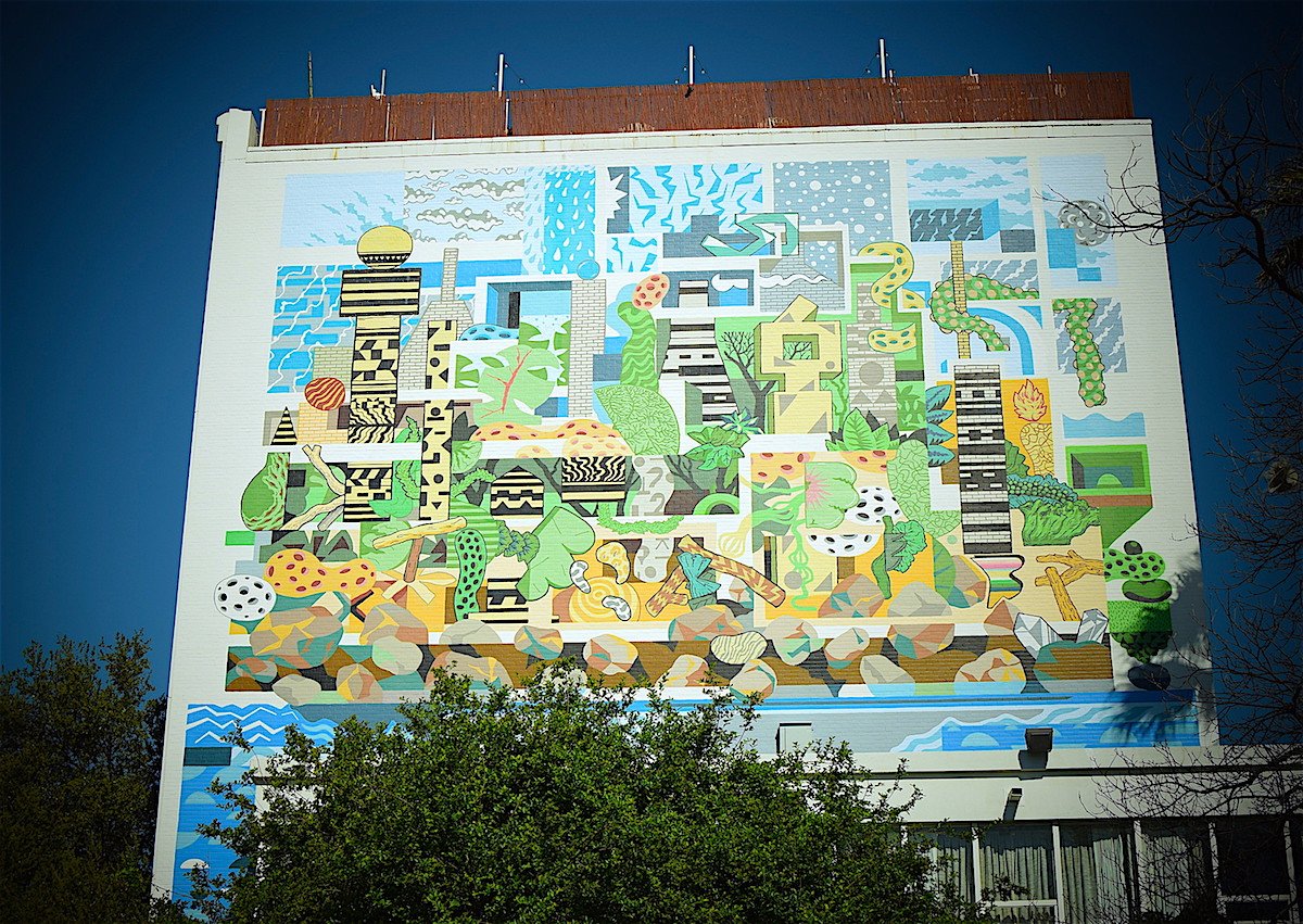 ElTropicano's tweet photo. As part of the 2014 @LuminariaSA, Basco Vazko painted a 5 story mural on our south exterior to accent the culture of #SanAntonio. #ElTrop https://t.co/g8FlAjtmy9