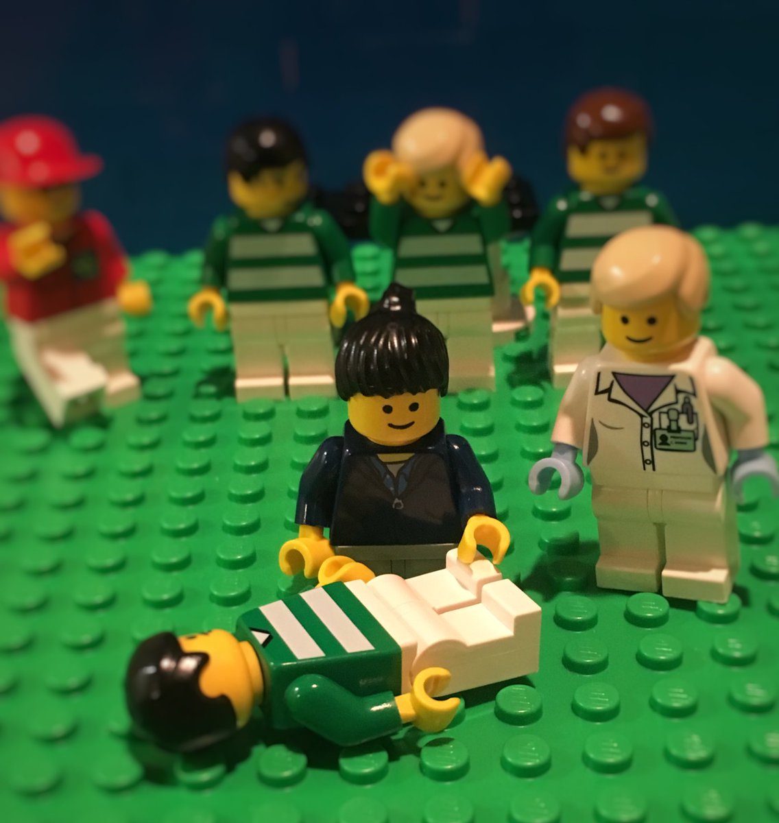 LEGO athletic trainer evaluates an ankle on the field as a parent magically appears to offer his urology services. #LegoATC #imadoctor