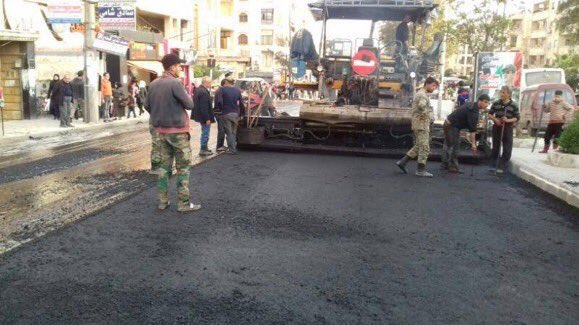 Inthepeninsula's tweet photo. "Tyrant" #Assad is paving the roads in liberated #Aleppo #Syria now. "The last road in #Aleppo was just paved over". 😂😂 https://t.co/wducGt7wf6