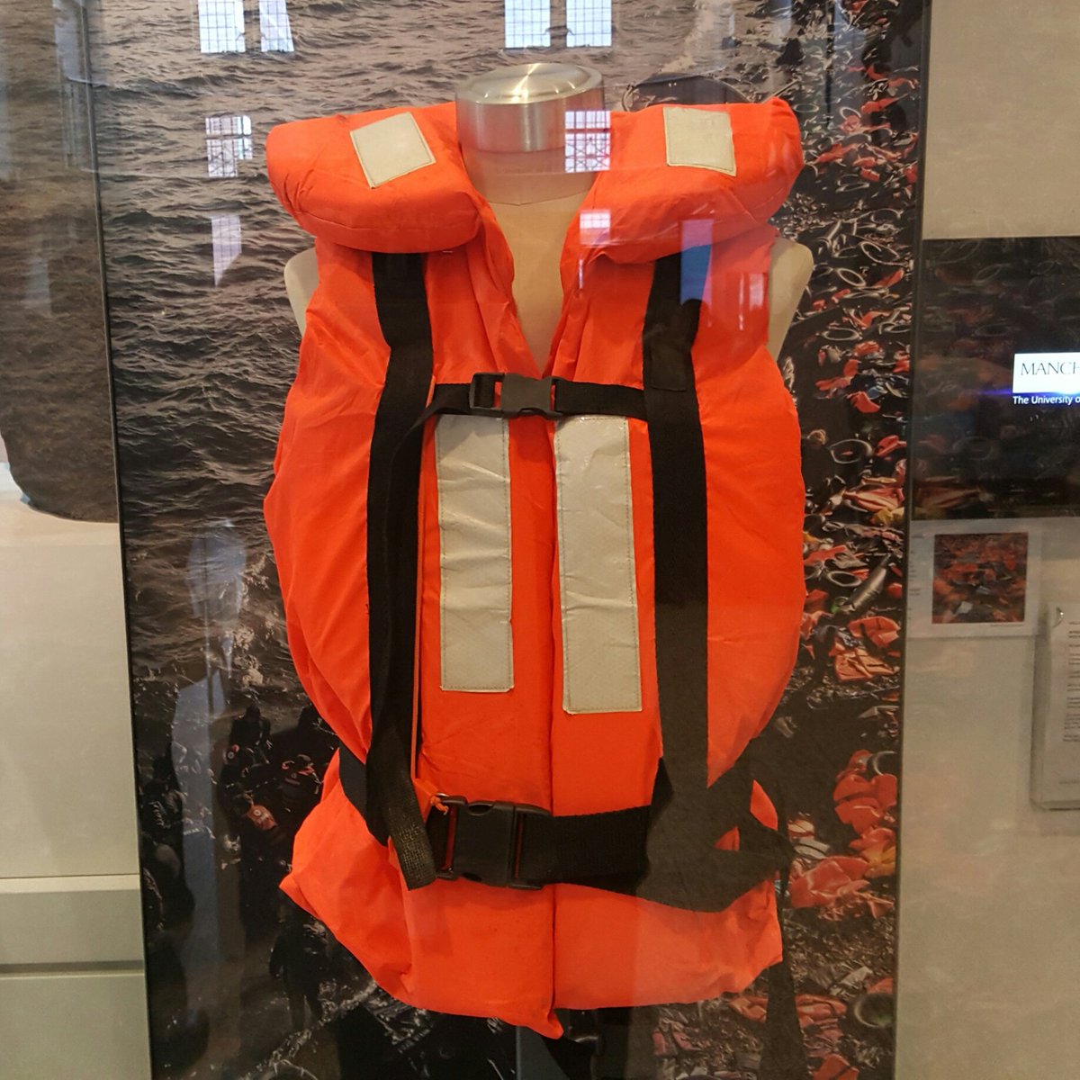 LovekinTom's tweet photo. Refugee's life jacket found abandoned on the shores of Lesvos in 2015. Now in the Manchester Museum #MMLifeJacket https://t.co/2YXJ4qpZbO