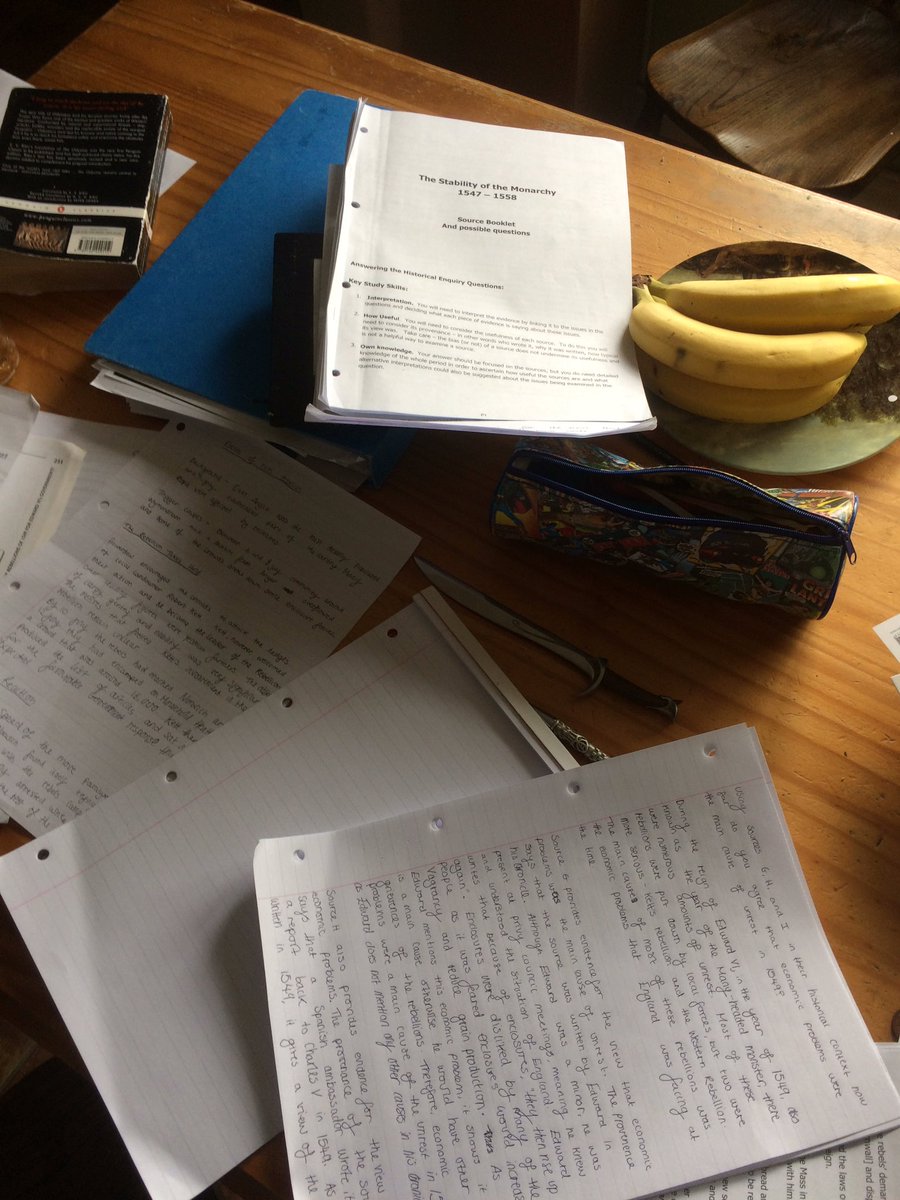 2/5 essays done! My table is a mess 😂😂