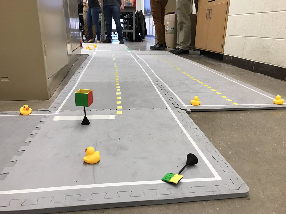 mturesearch's tweet photo. Students program the cars to recognize the yellow lines. And avoid ducks. #NationalRoboticsWeek https://t.co/QKQGBDozxJ
