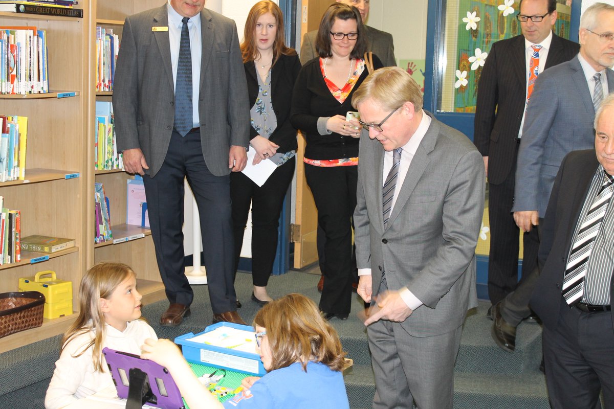 StMargueritecs's tweet photo. Julie &amp; Brody lead the Minister Eggen and Evergreen on school tour! #Rejoice #LearningCommons #WOWZERS https://t.co/FO7w1GSGj6