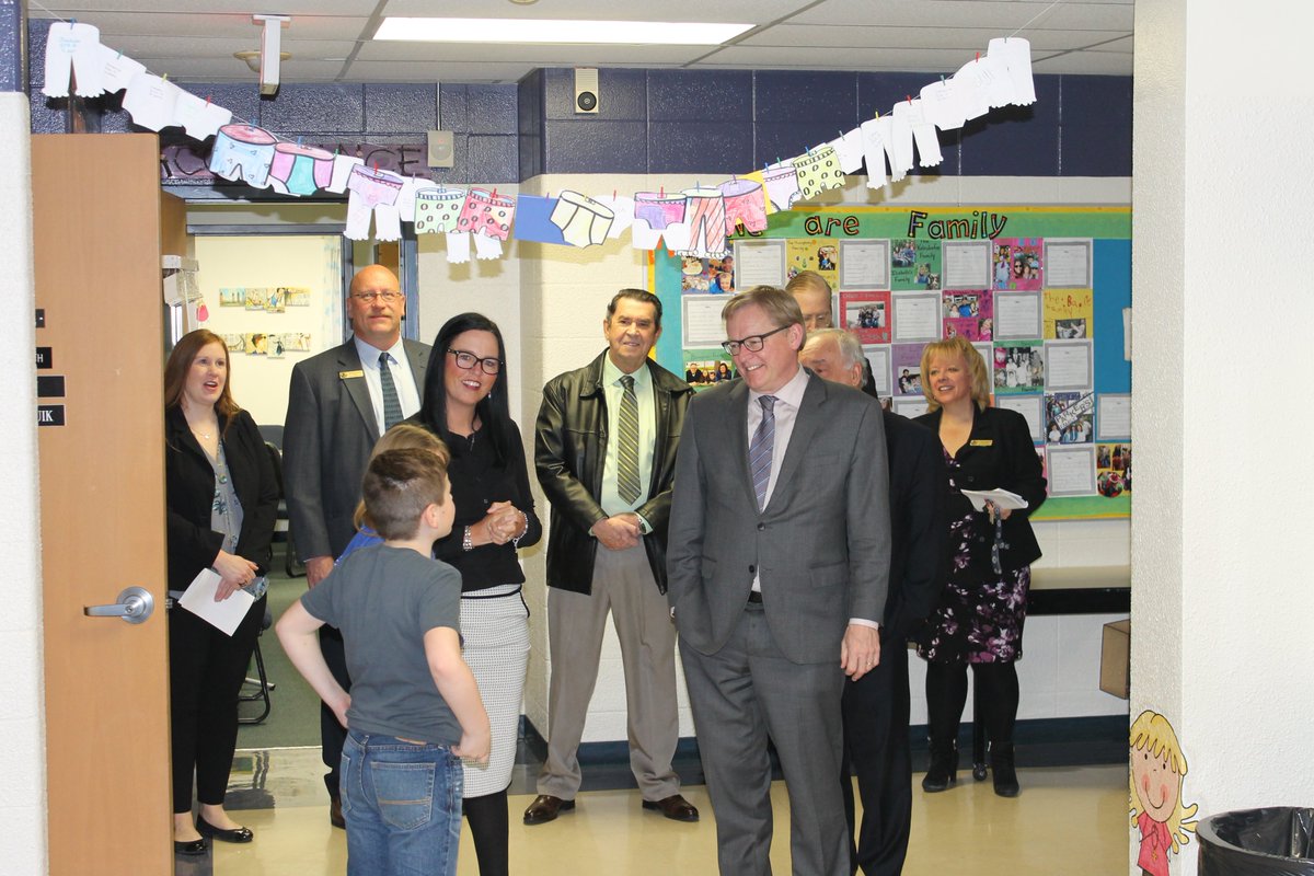 StMargueritecs's tweet photo. Julie &amp; Brody lead the Minister Eggen and Evergreen on school tour! #Rejoice #LearningCommons #WOWZERS https://t.co/FO7w1GSGj6