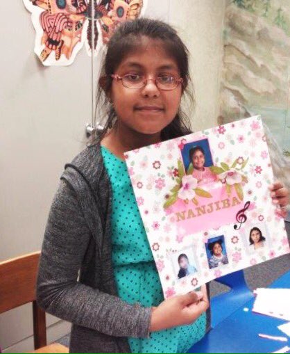 ArlingtonVALib's tweet photo. Yesterday Ms. C showed kids at Columbia Pike how to use scrapbooking to capture their favorite things #springbreakatthelibrary https://t.co/CZHJKbuC1e