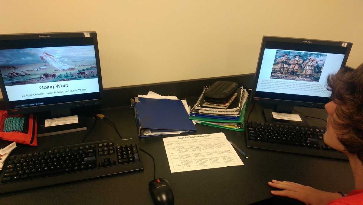 SW8Silver's tweet image. Students working collaboratively with Google slides to create digital storybooks over "groups going west."
