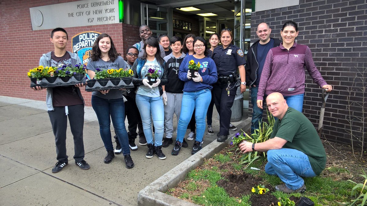 NYPD107Pct's tweet photo. Spring has sprung here, and a little ran cant stop us! Big thanks to all of our #NYPDExplorers that came help plant. #COPANDKIDS https://t.co/WVJdOy894n