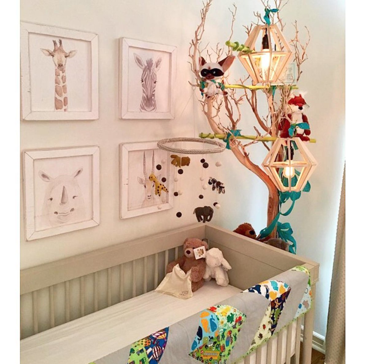 efl_sales's tweet photo. In love with baby Henry Jennings McMillan's WILD safari themed nursery! Such a creative way to hang @fionawalkerltd's Neutral Safari Mobile! https://t.co/TamFTvK9cu