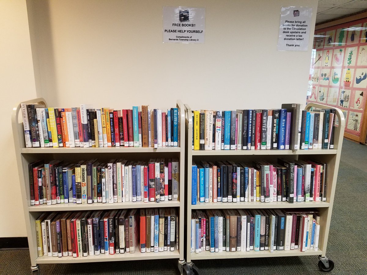 Transformation of the cluttered free book truck in the foyer into the new space tucked neatly behind the stairway. #MAINTransforms