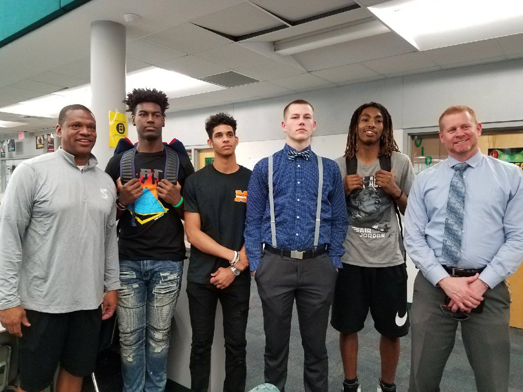 Coach_RGarcia's tweet photo. Teammates Bryce Workman and Denari Garrett dropped by for the signing. https://t.co/UkAg02edPz