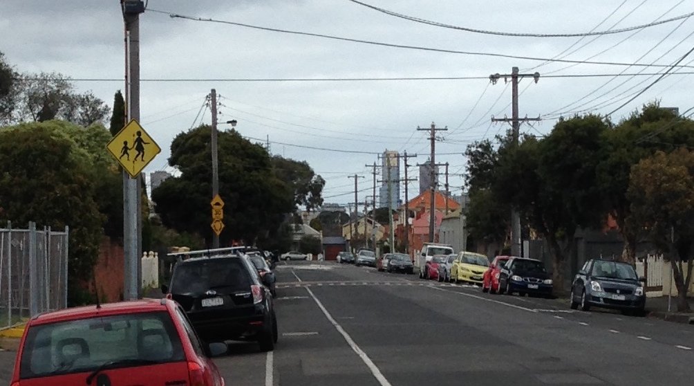Road safety PSA: Whatever lines you see on the street, don't expect a cyclist to ride within an open door's reach of parked cars. #doorzone