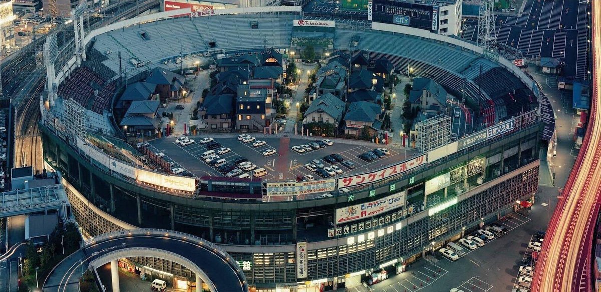 JamesMelville's tweet photo. This is incredible. Houses and streets that have been built inside a stadium in Japan. https://t.co/natSVvsiPb