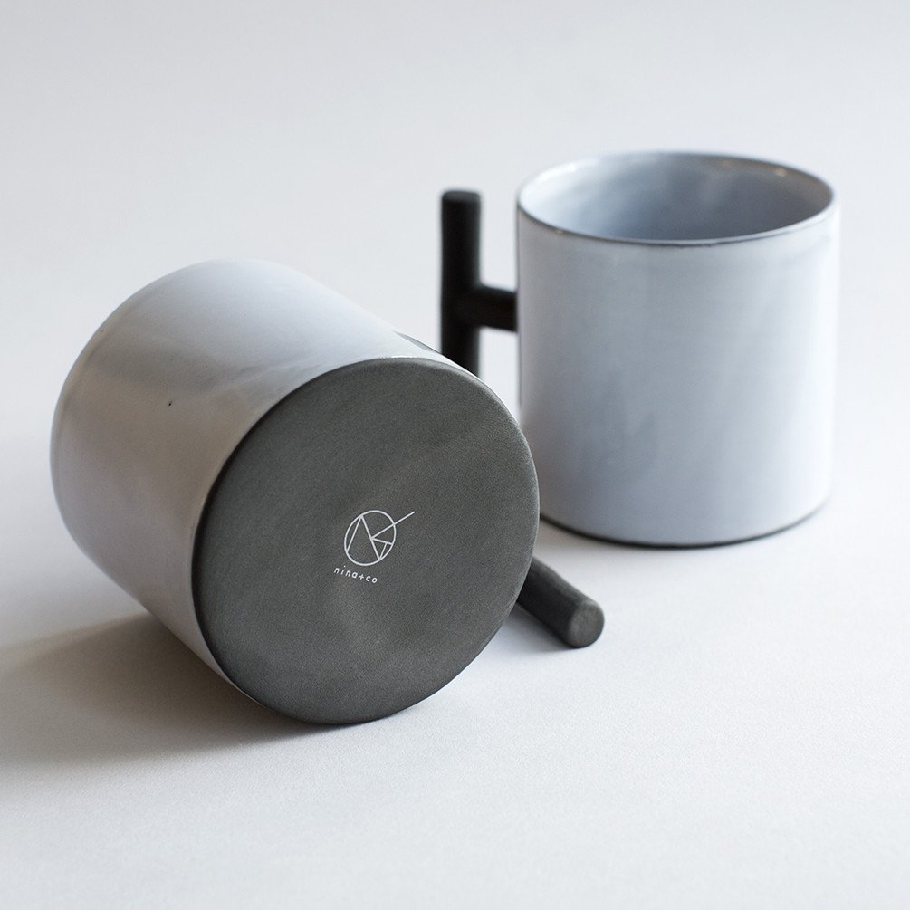 Our new mugs by <a href="/ninaandcodesign/">Nina+Co</a> The contrast between matt black and gloss white is fantastic and incredibly tactile #tableware #ceramics