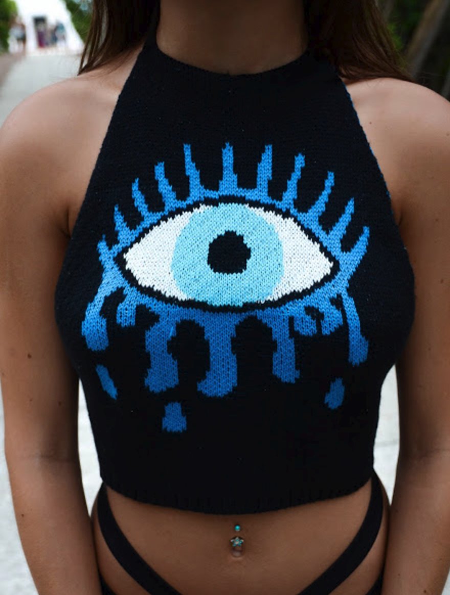 Storenvy's tweet image. This Evil Eye Knit Halter Crop Is PERFECT! bit.ly/2pyGDzb