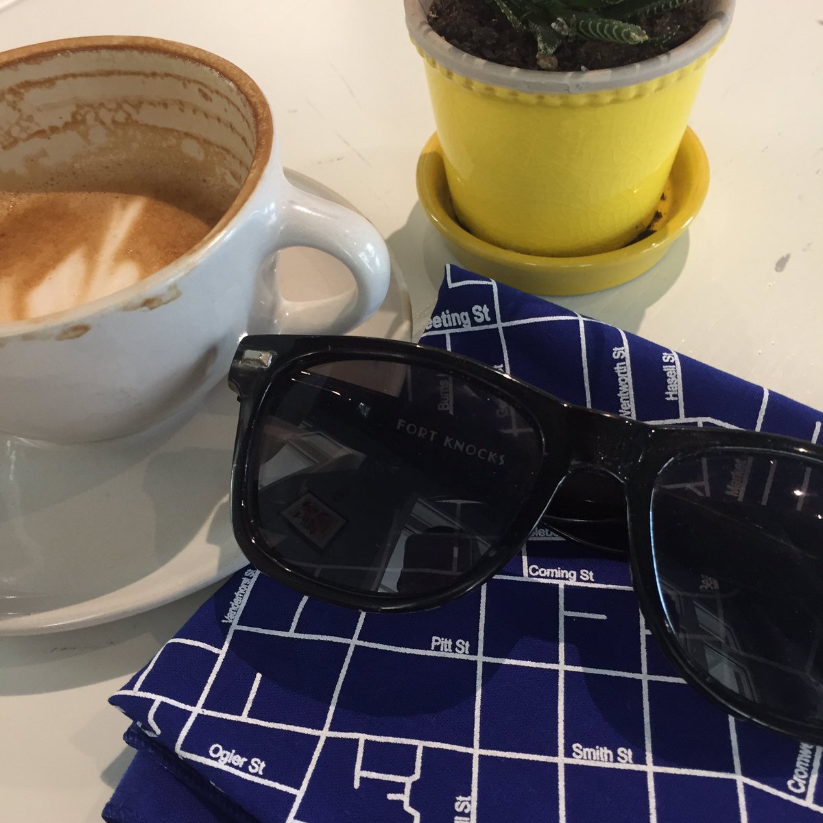 Maps and coffee and succulents