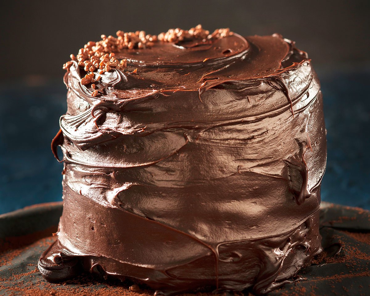 Moist chocolate cake with coconut ganache and white chocolate cream-cheese ...