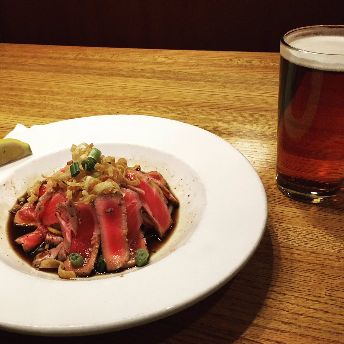 PearlBrewing's tweet photo. Sliced Ahi Tuna over fresh cucumber salad and a Trainwreck amber Ale.  #foodporn #FishFryFriday #brewery #buffalony #buffalo #ahi #amberale https://t.co/rTWzjXeSxQ