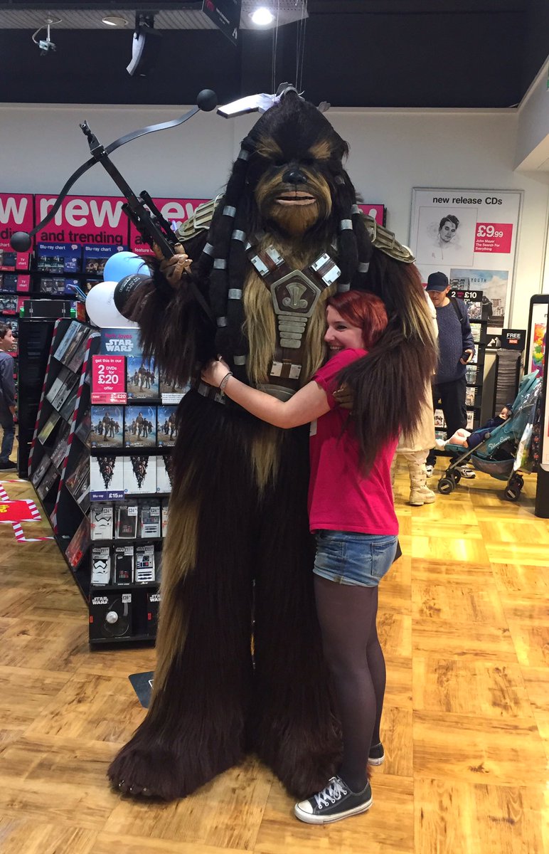 hmv_Plymouth's tweet photo. I don't think Jess has ever been happier! A Wookie hug looks like the best kind of hug. #StarWars #HmvLovesStarWars @hmvtweets https://t.co/1Fvos3mrXM