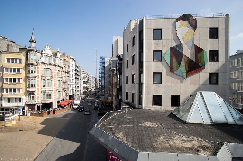 CONTEMPORIST's tweet image. A Large Recycled Wood Mural Was Installed On The Side Of This Building In Belgium bit.ly/2pbAoVA

#art #mural #design