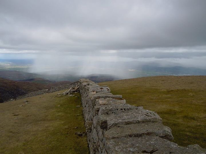 ulsterpooka's tweet photo. Slieve Donard was covered with people. The rest of my dander along the wall was quiet as I ducked into a water tower to escape a rain shower https://t.co/MKU62pjny8
