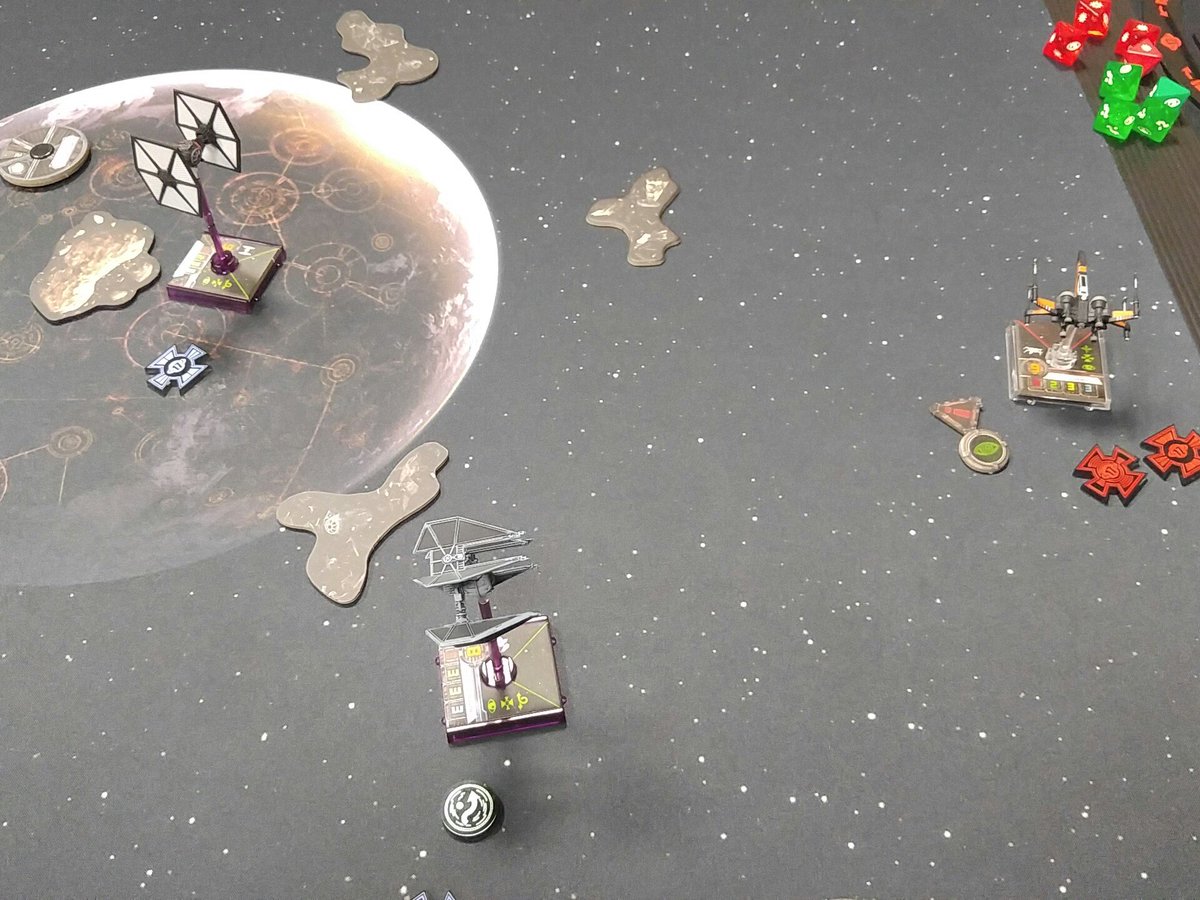 FFGOP's tweet photo. Poe Dameron's shields are gone, and Jeremy's ships are closing in, but Zach isn't out of it yet! #XWingOpen https://t.co/8R6cXuJv77