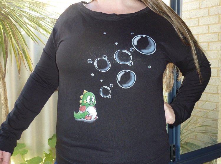 StingRoll's tweet photo. My Bubble Bobble design on a ladies top @threadless. Turned out awesome! #stingroll #bubblebobble #ladiesfashion #shirt #gaming https://t.co/E6ukZRMRdR