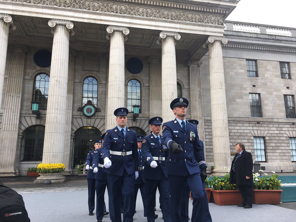 DublinTown's tweet photo. Army Officer from @defenceforces reads the Proclamation outside the GPO and the wreath laid by the President on behalf of the people of Eire https://t.co/wOxaH4NwAa