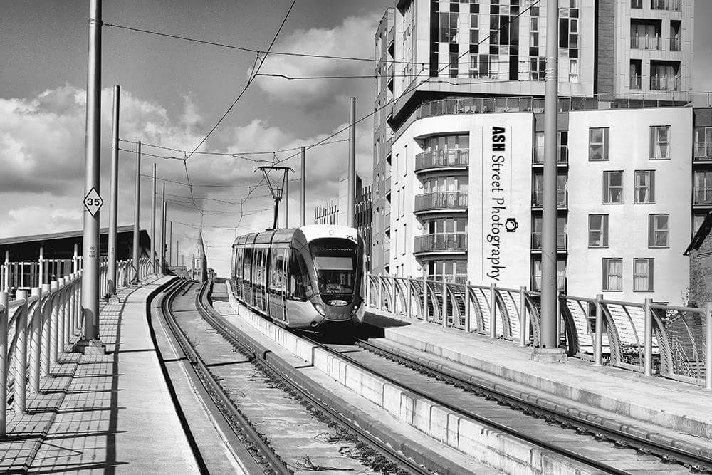 AshWroughton's tweet photo. Spontaneous shot whilst crossing the tramlines in #Nottinghm #blackandwhitephotography https://t.co/VVmLClrkX1