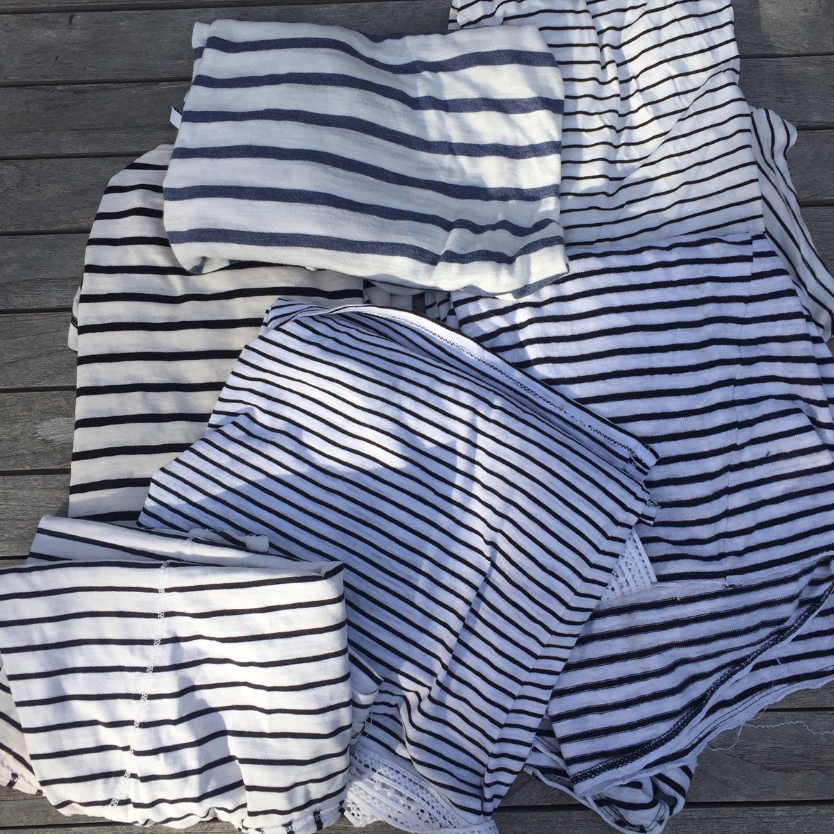 Racey19's tweet photo. Trying to find something to wear on Hawthorn v Geelong day...The struggle is real. #rejectpile #AFLHawksCats https://t.co/42xouq0LDI