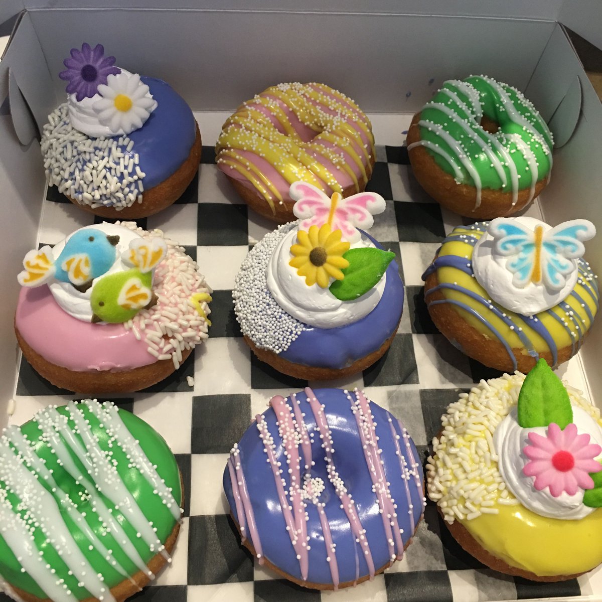 #Spring is in full bloom here at the shop! Check out our seasonal #donut designs!