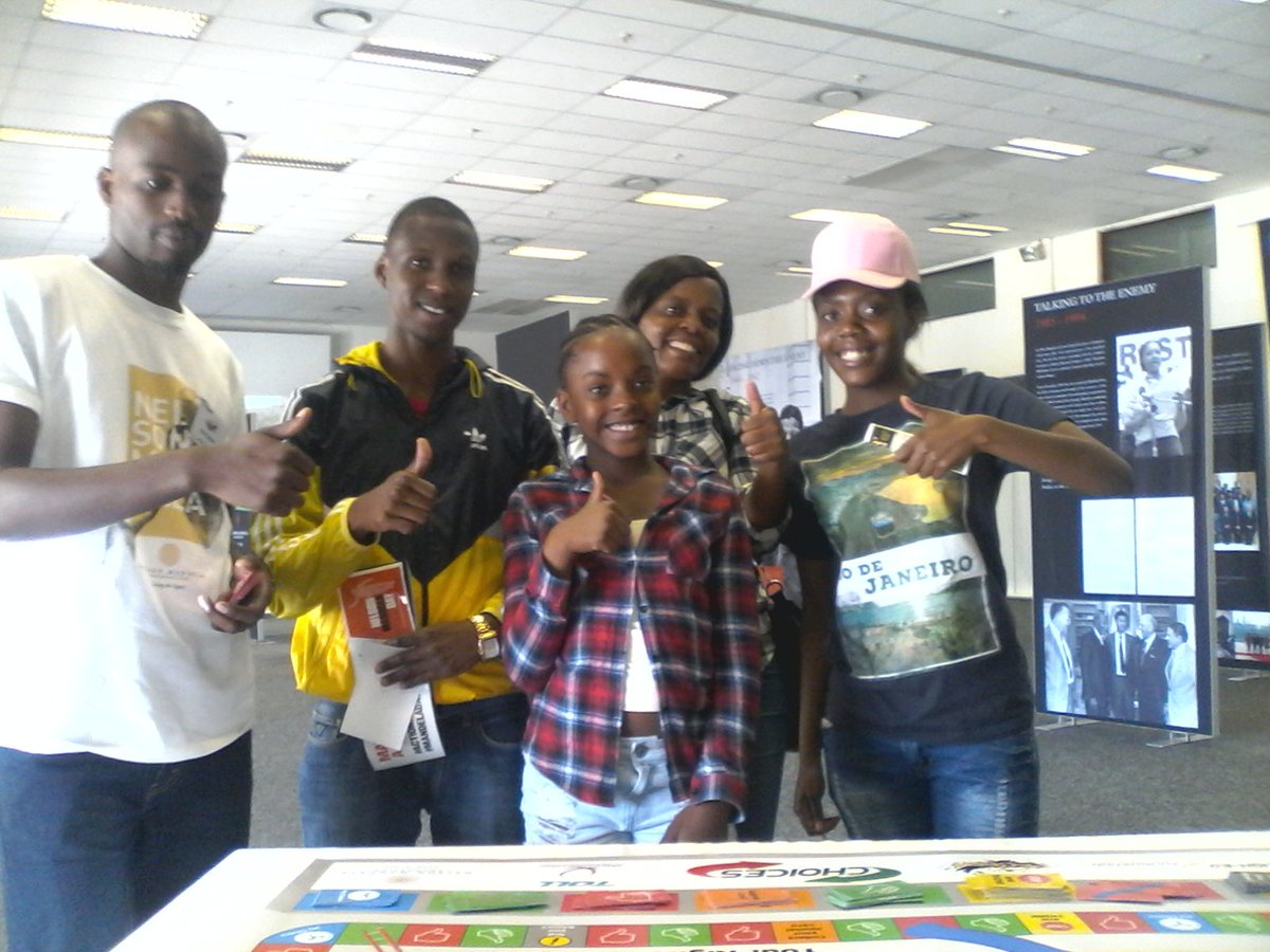 align_ed's tweet photo. Ndebele family play CHOICES game @MandelaDay @Rand_Show #actionagainstpoverty #choices #salearns #salearnspecrew BLACK EAGLE Hall@Rand_Show https://t.co/aTuSPAaugR