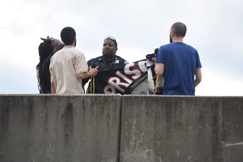 ISMPalestine's tweet photo. On time for the commemoration of #PrisonersDay in #Palestine, Baltimore Palestine Solidarity and Baltimore Jail support did a banner drop https://t.co/IWaYJ7dxlh