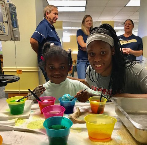OxbridgeAcademy's tweet photo. The girls' basketball team spent time with patients @PalmBeachChildrensHospital over the weekend. #OxbridgeCares https://t.co/NFst4cPxli