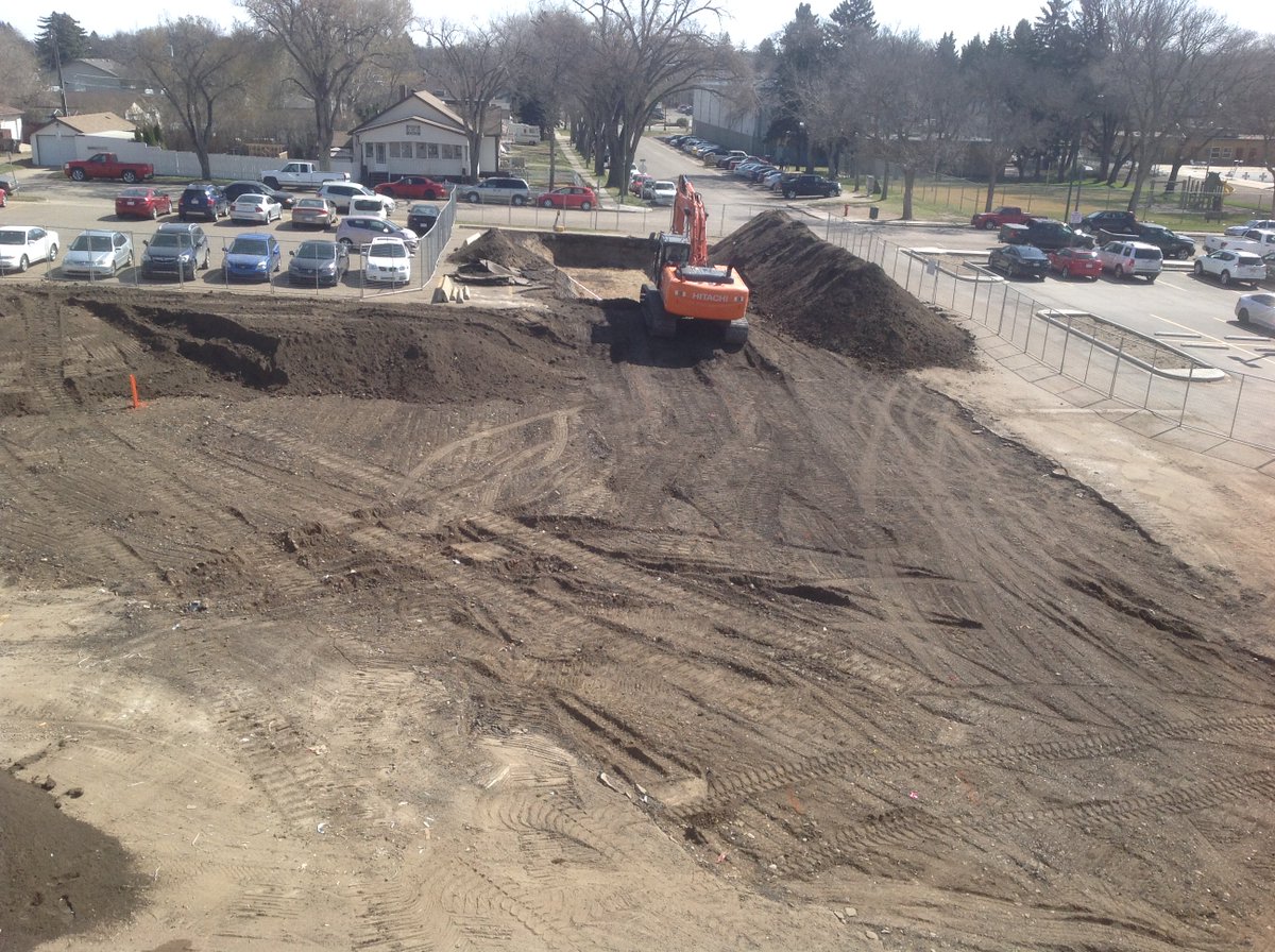 MedHatHigh's tweet photo. MHHS Parking lot prep for the retaining wall... #MHHSModernization #GrahamConstruction https://t.co/pOeWnZhGiH